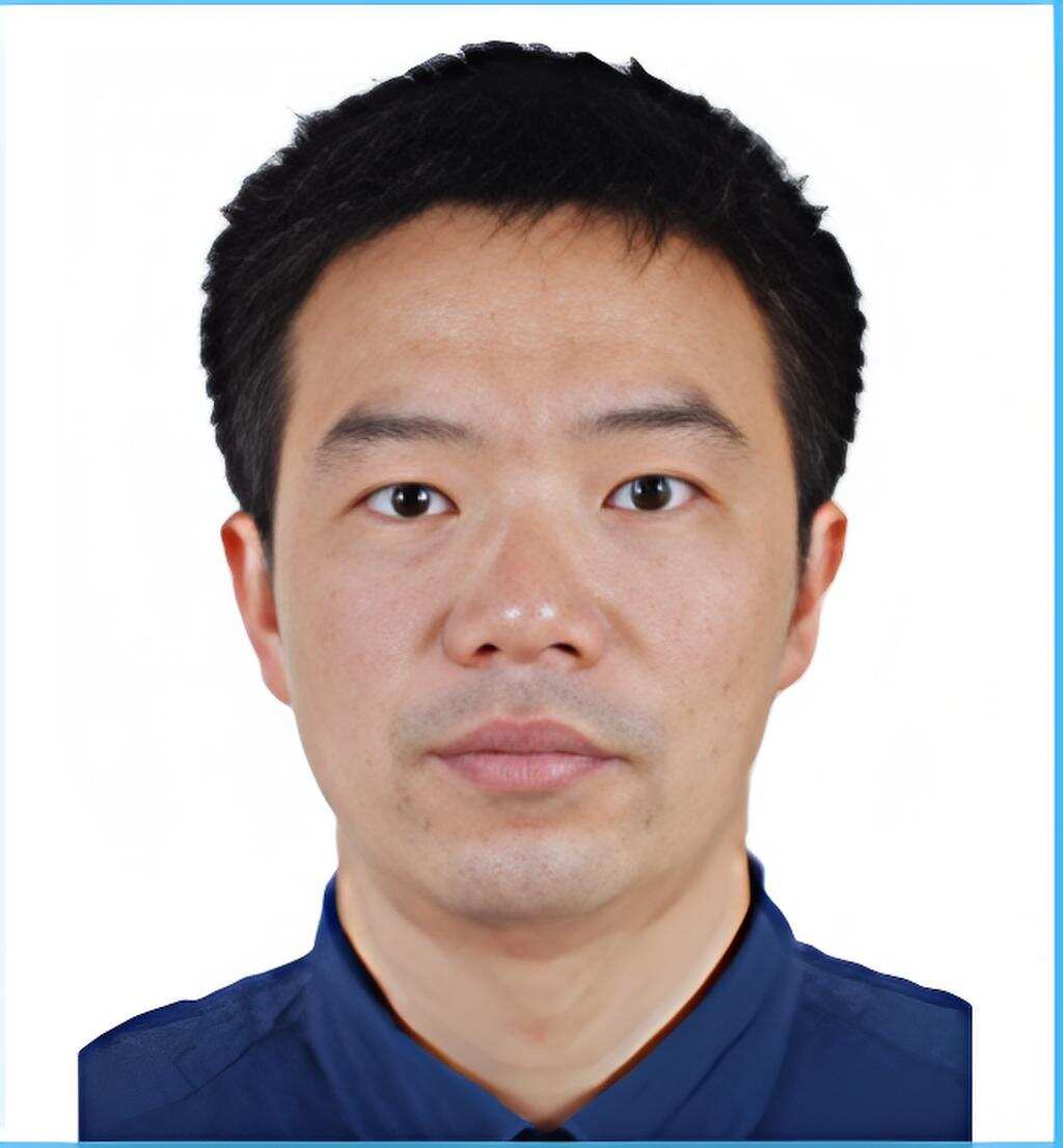 譚明